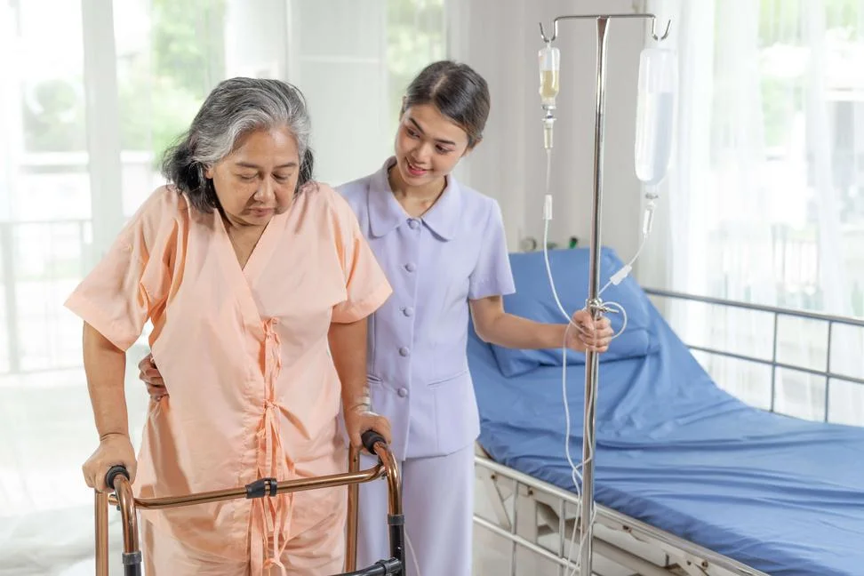 Saisha nurse checking health parameters of a senior citizen at home