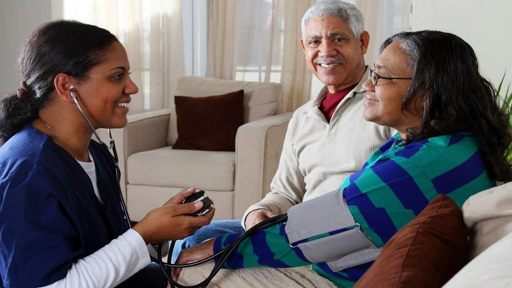 Elderly patient with loving home attendant